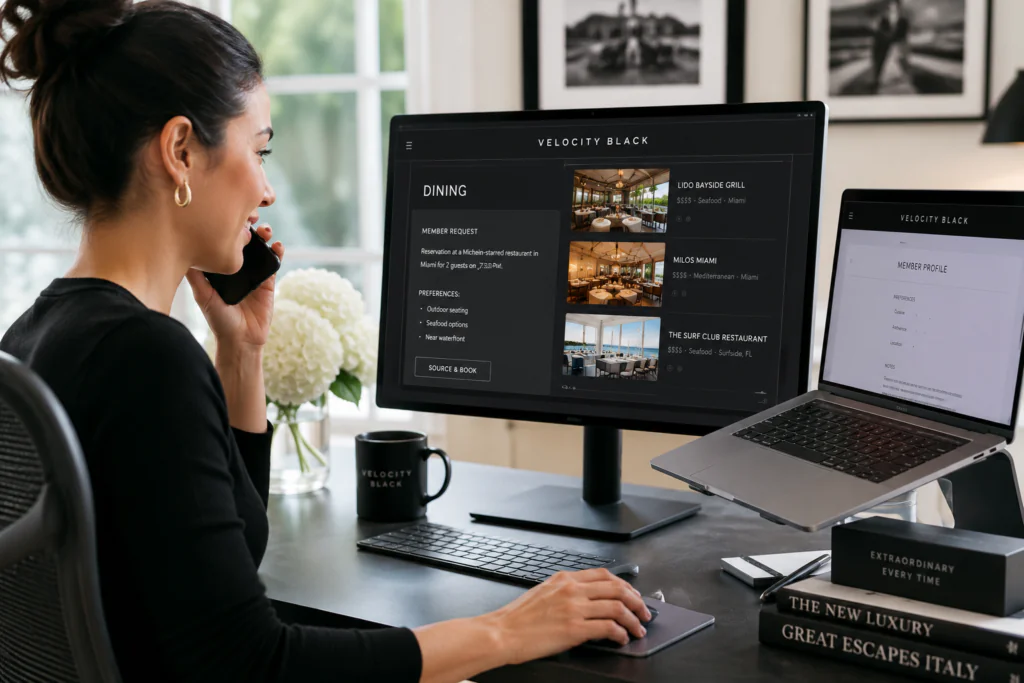 Woman on a call at a desk with a large monitor showing a dining options app.